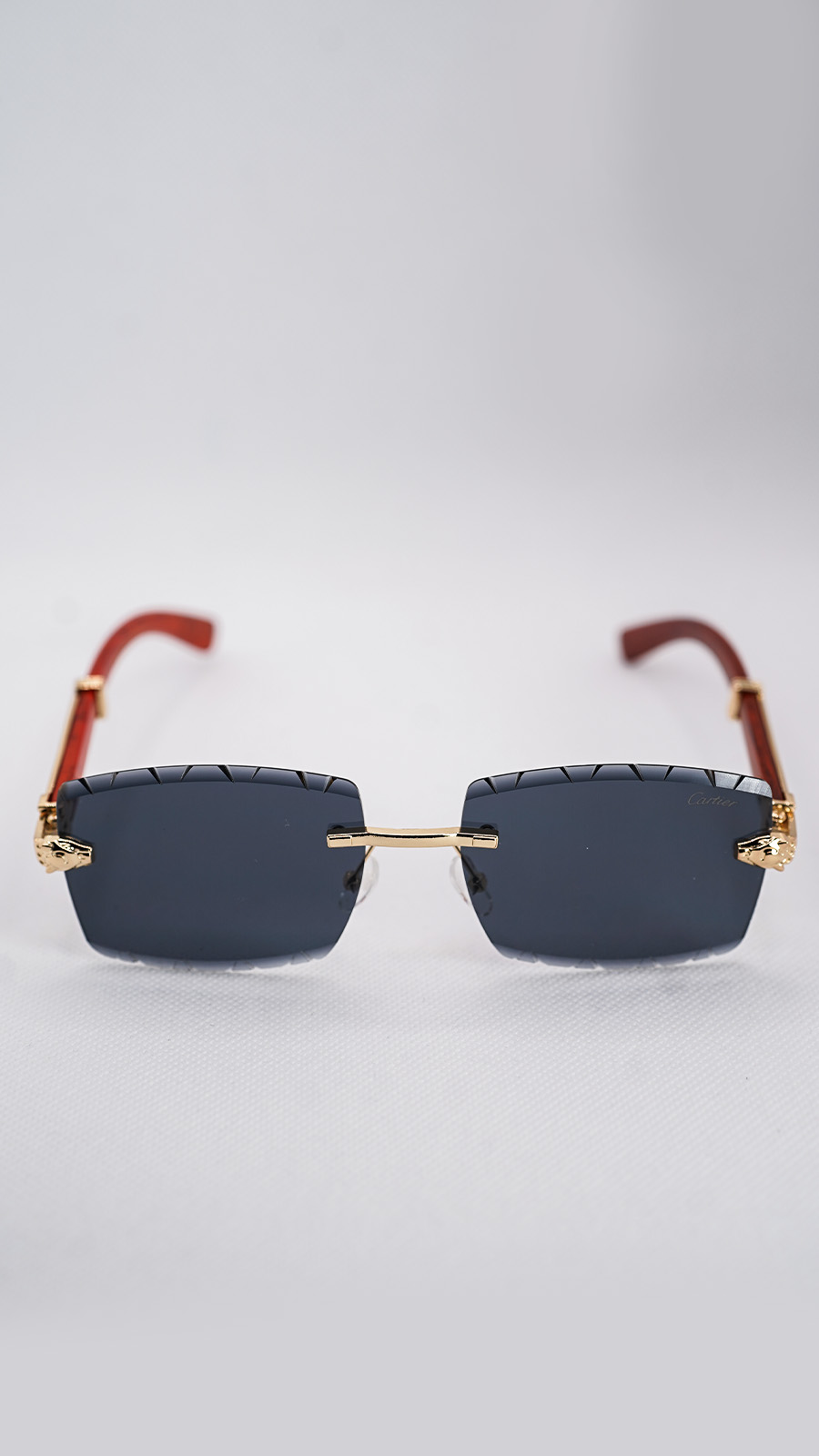 عینک آفتابی کارتیر فریم بدون قاب طلایی