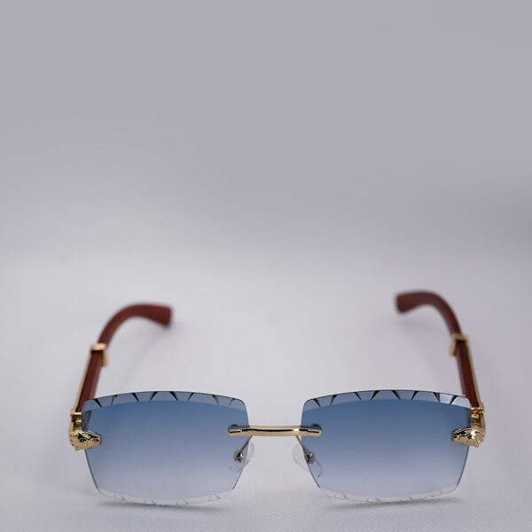 عینک آفتابی کارتیر فریم بدون قاب طلایی با عدسی گرادینت آبی