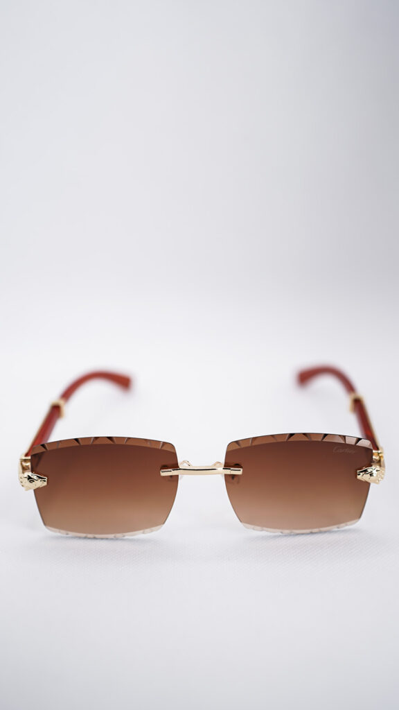عینک آفتابی کارتیر فریم بدون قاب طلایی با عدسی گرادینت قهوه‌ای
